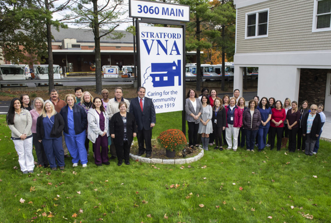 Stratford VNA Staff around the new sign