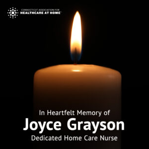 Image shows a candle with the text "In Heartfelt Memory of Joyce Grayson."